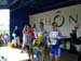076 Podium des Féminines au centre C Caillot du VC Velay 1ère à sa gauche 2ème C Harnois du VCLVV, à sa droite 3ème V Mercier du VC St Rambert